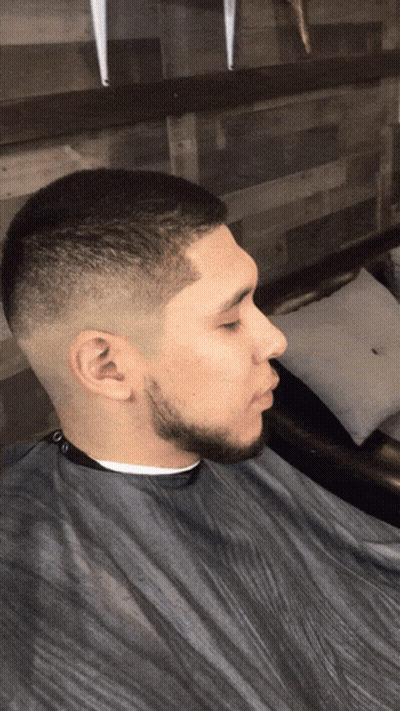 Man with Beard Getting Haircut