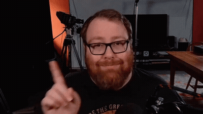 Man With Beard Glasses And Off The Grf Shirt GIF