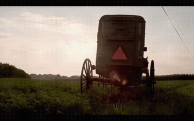 Man With Beard Hat And Suspenders Smiling GIF