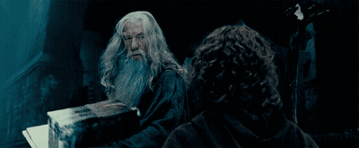 Man With Beard Holding Book GIF