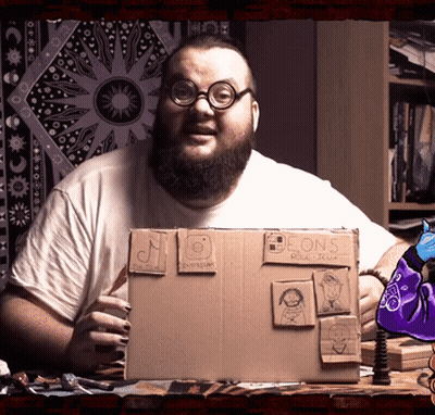 Man With Beard Holding Box Saying Beons GIF