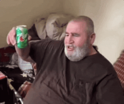 Man With Beard Holding Can Of 7 Up GIF