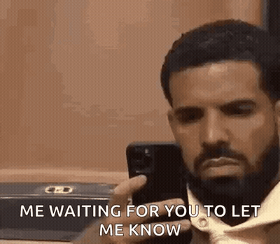 Man With Beard Holding Cell Phone GIF