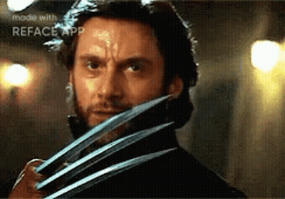 Man With Beard Holding Claws GIF