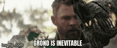 Man With Beard Holding Dinosaur Statue GIF