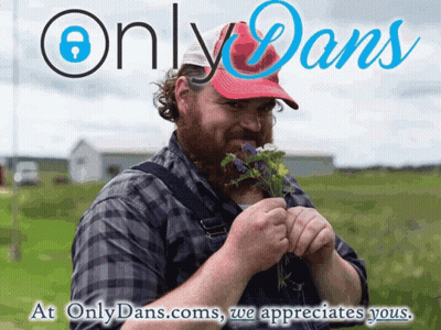 Man With Beard Holding Flowers In Front Of OnlyDans.com Sign GIF