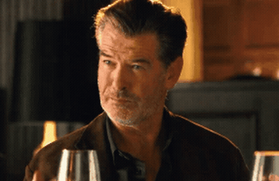 Man With Beard Holding Glass Of Wine GIF