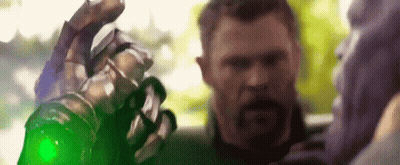 Man With Beard Holding Green Glove GIF