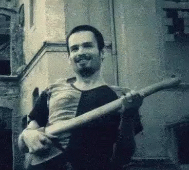 Man With Beard Holding Guitar GIF