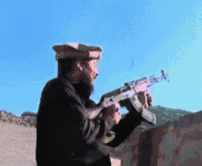Man With Beard Holding Gun GIF