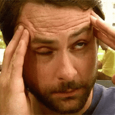Man With Beard Holding Head GIF