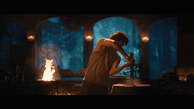 Man With Beard Holding Large Knife GIF
