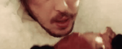 Man With Beard Holding Meat GIF