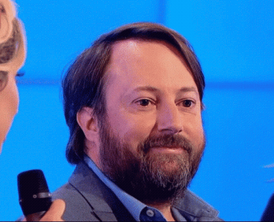 Man With Beard Holding Microphone GIF