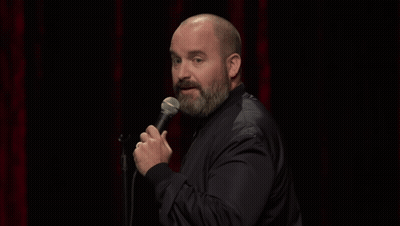 Man With Beard Holding Microphone GIF