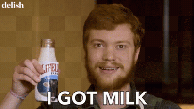 Man With Beard Holding Milk Says I Got Milk GIF