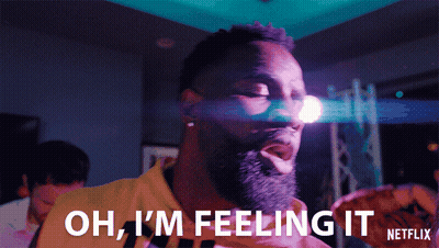Man With Beard Holding Pizza Says Oh I'm Feeling It GIF