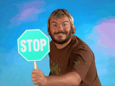 Man With Beard Holding Stop Sign GIF