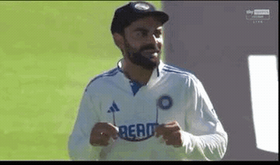 Man With Beard Holding Sunglasses GIF