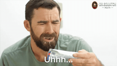 Man With Beard Holding Toothpaste Tube GIF