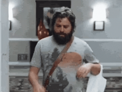 Man With Beard Holding Towel GIF