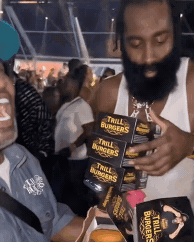 Man With Beard Holding Trill Burgers Boxes GIF