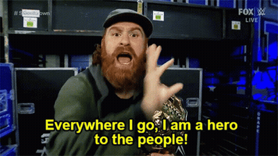 Man With Beard Holding Trophy Everywhere I Go I Am A Hero To The People GIF