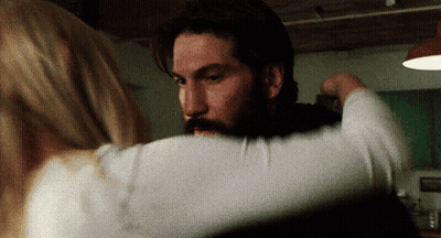 Man With Beard Hugging Blonde Woman GIF