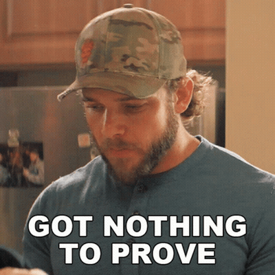 Man With Beard In Baseball Cap Says Got Nothing To Prove GIF