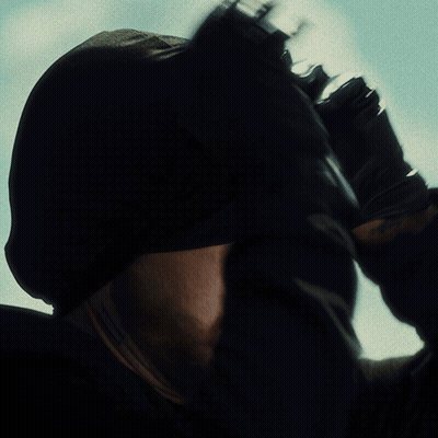 Man With Beard In Black Hat And Earring GIF