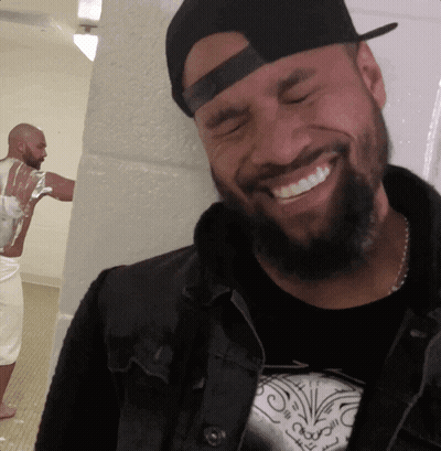 Man With Beard In Black Hat And Jacket GIF