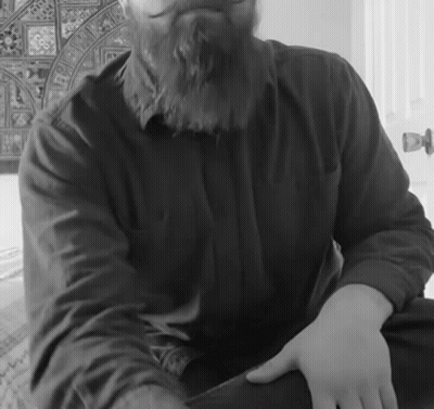 Man With Beard In Black Shirt GIF