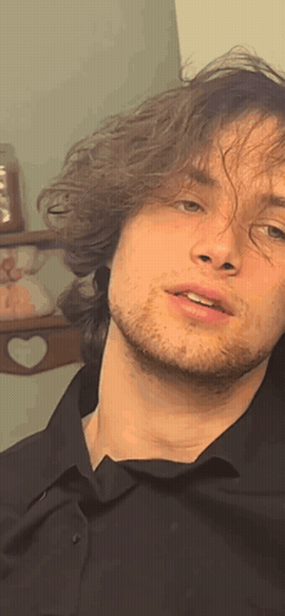 Man With Beard In Black Shirt GIF