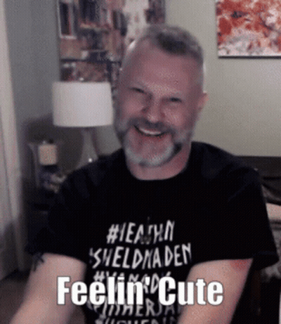 Man With Beard In Black Shirt Saying Feelin Cute GIF