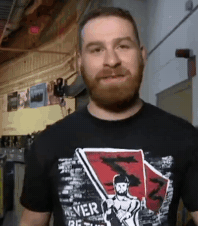 Man With Beard In Black Shirt Saying Never Be Stuck GIF