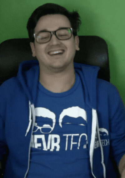 Man With Beard In Black Shirt Saying What's Up Everyone GIF