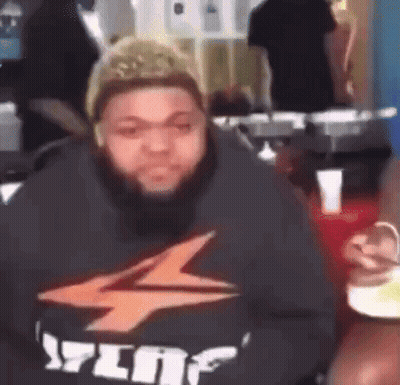 Man With Beard In Black Shirt Saying Ylop GIF