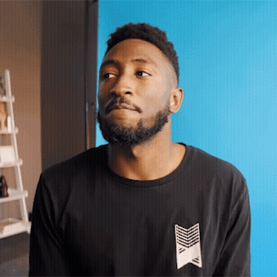 Man With Beard In Black Shirt With Arrow GIF