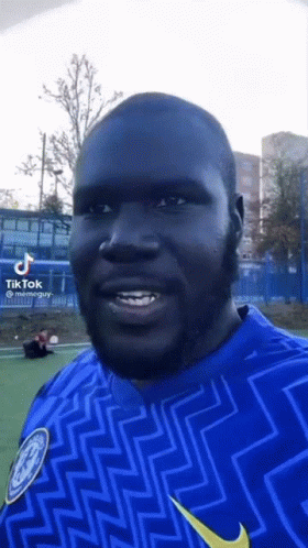 Man With Beard In Blue And Yellow Nike Shirt GIF