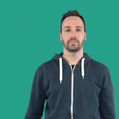 Man With Beard In Blue Hoodie Making Gesture GIF