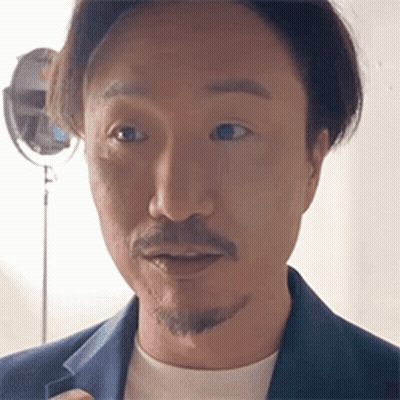 Man With Beard In Blue Jacket And White T-Shirt GIF