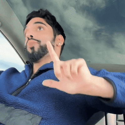 Man With Beard In Blue Jacket Thumbs Down GIF