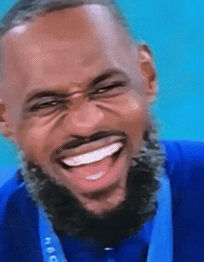 Man With Beard In Blue Shirt And Medal GIF