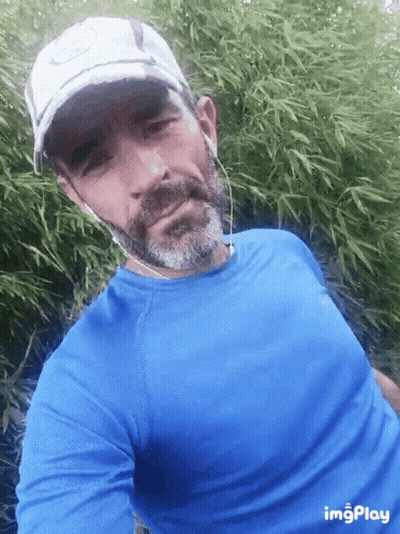 Man With Beard In Blue Shirt And White Hat GIF
