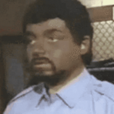 Man With Beard In Blue Shirt And White Tie GIF