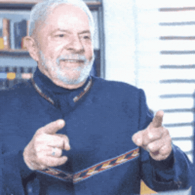 Man With Beard In Blue Shirt Pointing GIF