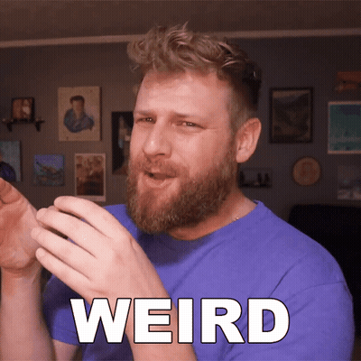 Man With Beard In Blue Shirt Saying Weird GIF