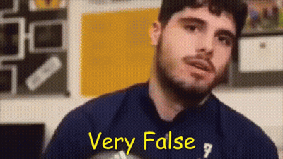 Man With Beard In Blue Shirt Says Very False GIF
