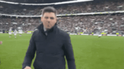 Man With Beard In Blue Soccer Jersey Blowing Kiss GIF