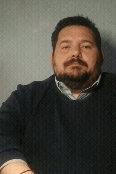 Man With Beard In Blue Sweater And Blue Shirt GIF